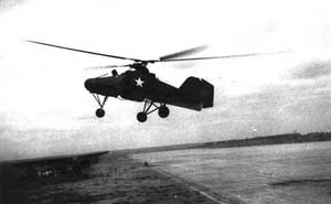 Left side view of a captured Flettner Fl 282 helicopter undergoing evaluation with US forces