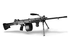 Right side view of the CIS Ultimax 100 light machine gun; note forward carrying handle and 100-round drum magazine