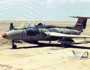 Forward left side view of an abandoned L-29 in Iraq