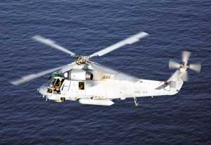 High-angled left side view of the Kaman SH-2 Seasprite in flight