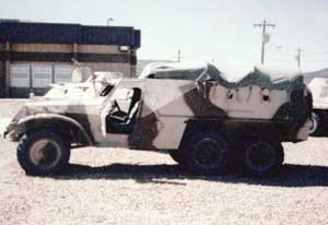 Left side profile view of the BTR-152 armored personnel carrier on display; color