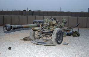 Front left side view of an M119 at rest