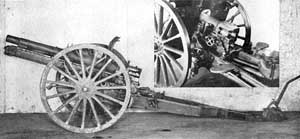 View of both the Type 38 Improved gun system and shot of the breech mechanism