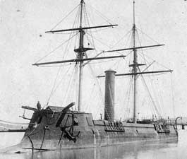 Bow portside view of the CSS Stonewall ironclad; note combination of funnel and twin masts as well as bow ram assembly