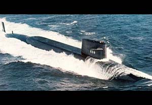 High angled front right side view of the USS Ethan Allen submarine at sea