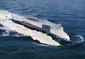 High-angled bow-to-starboard view of the USS Tullibee SSN-597 at speed; color