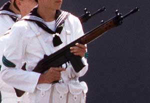 A Spanish sailor showcases his CETME Model C Assault Rifle on parade