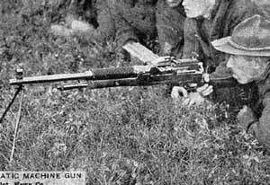 Left side view of the Hotchkiss M1909 machine-rifle during test firing with the Americans