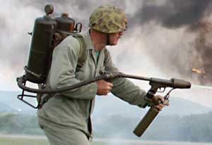 Close-up detail view of the M2 flamethrower; note improvised lighting system; color