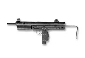 Left side view of the FMK-3 Mod 2 SMG; note collapsed wireframe stock and pistol-grip safety
