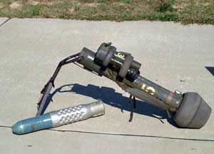 An M47 Dragon launcher and projectile on display; note bipod design and projectile size compared to launcher