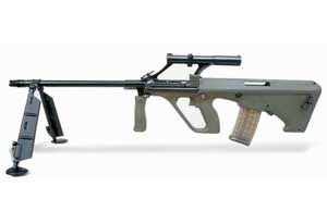 Left side view of the Steyr AUG-LMG clearly showcasing its origins in the AUG assault rifle; note transparent magazine, foldable bipod and integrated carrying handle