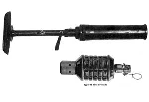 Views of the Type 10 50mm grenade discharger and its 50mm grenade