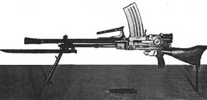 Left side view of the Type 99 Light Machine Gun with magazine in place, bayonet fixed and bipod extended.