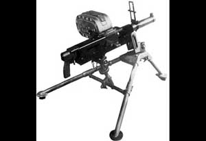 Rear right side view of the XM174 grenade launcher; note tripod mount and side canister