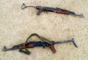 A pair of Zastava M80A assault rifles confiscated in Iraq; note metal folding stocks