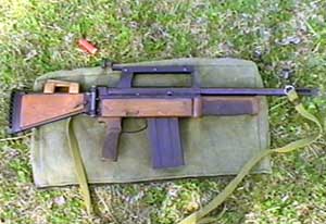 Right side profile view of the Armenian RB-12 slide-action shotgun